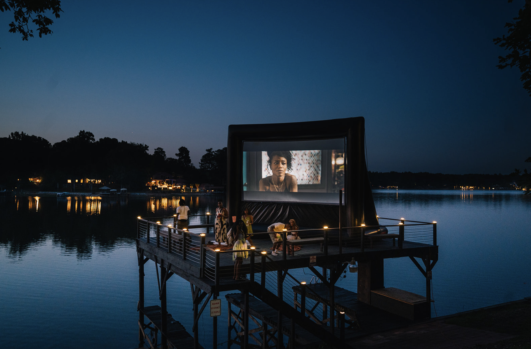 Lakeside dock transformed into an outdoor cinema at Ulommiri