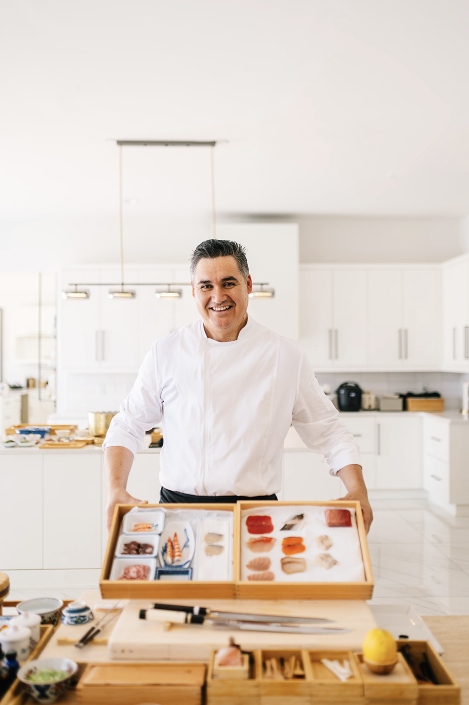 Chef Alex preparing a private omakase experience at Ulommiri
